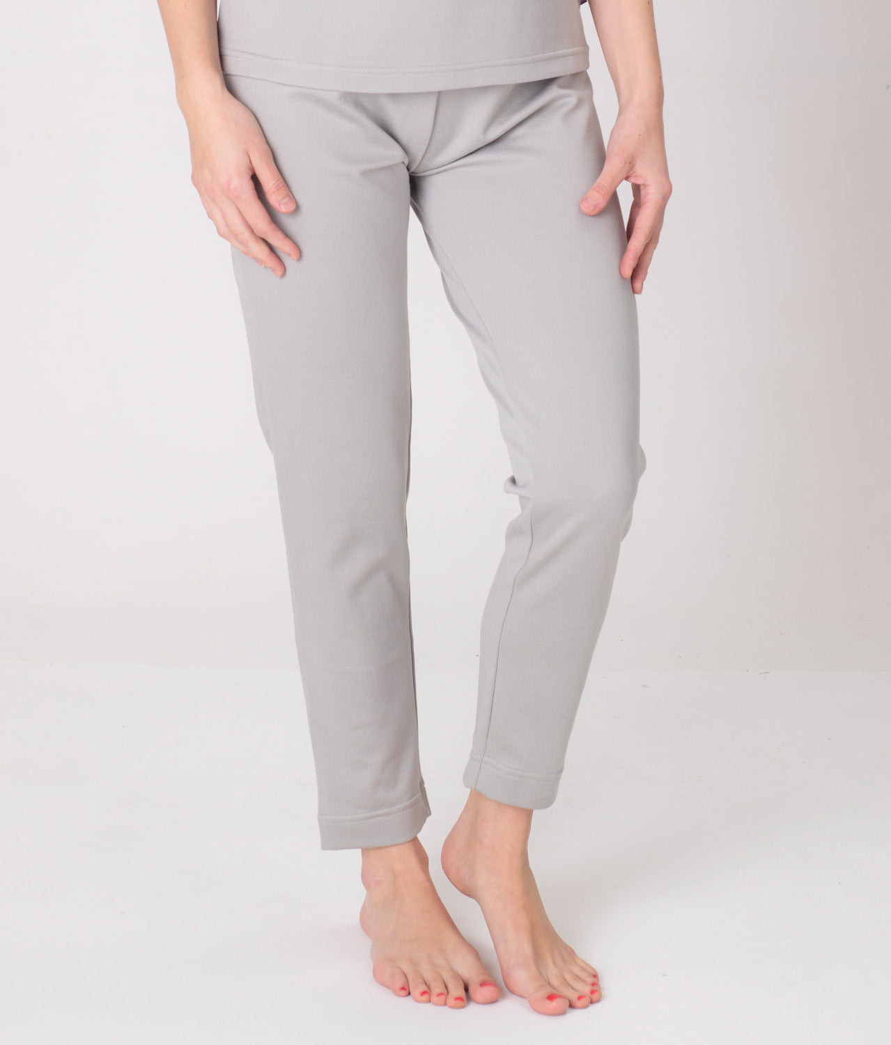 EMF shielding leggings Leblok in grey on a woman - front