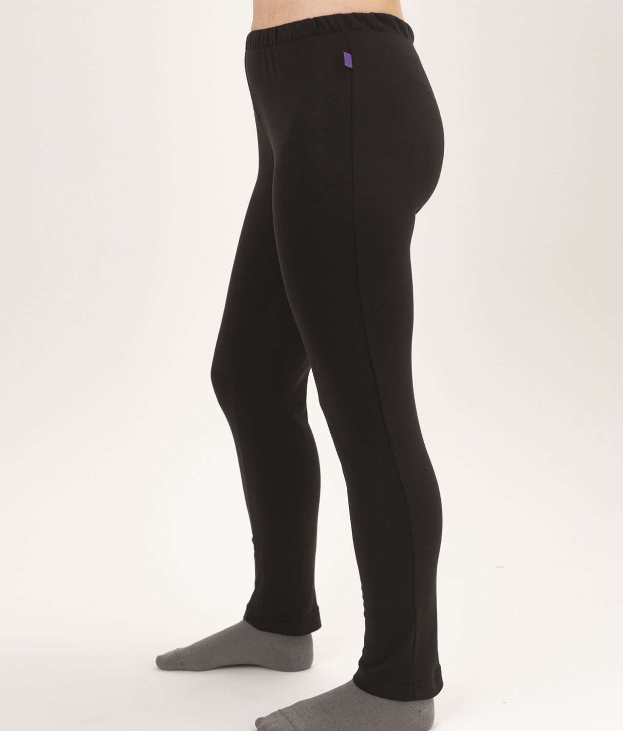 EMF shielding leggings Leblok in black on a woman - side